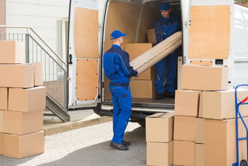 Removal company team preparing a move in Balham street with residential properties