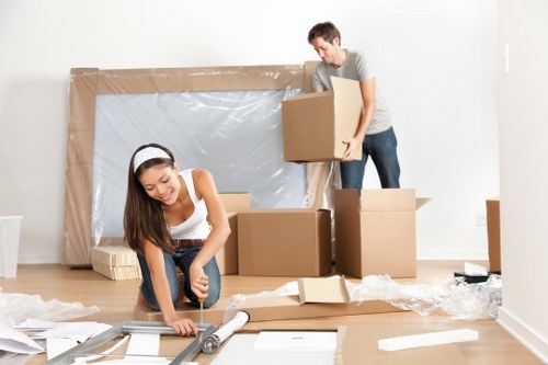 Man with van removal service helping a Balham customer move household items