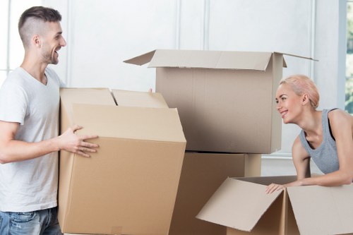 Removal crew handling furniture during a Balham move