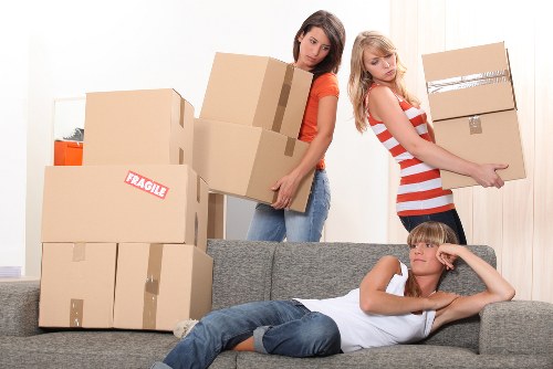 Packed boxes and furniture prepared for a home move in Balham