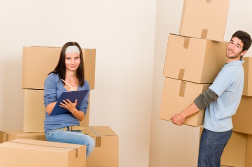 Balham removals team safely loading furniture into a moving van